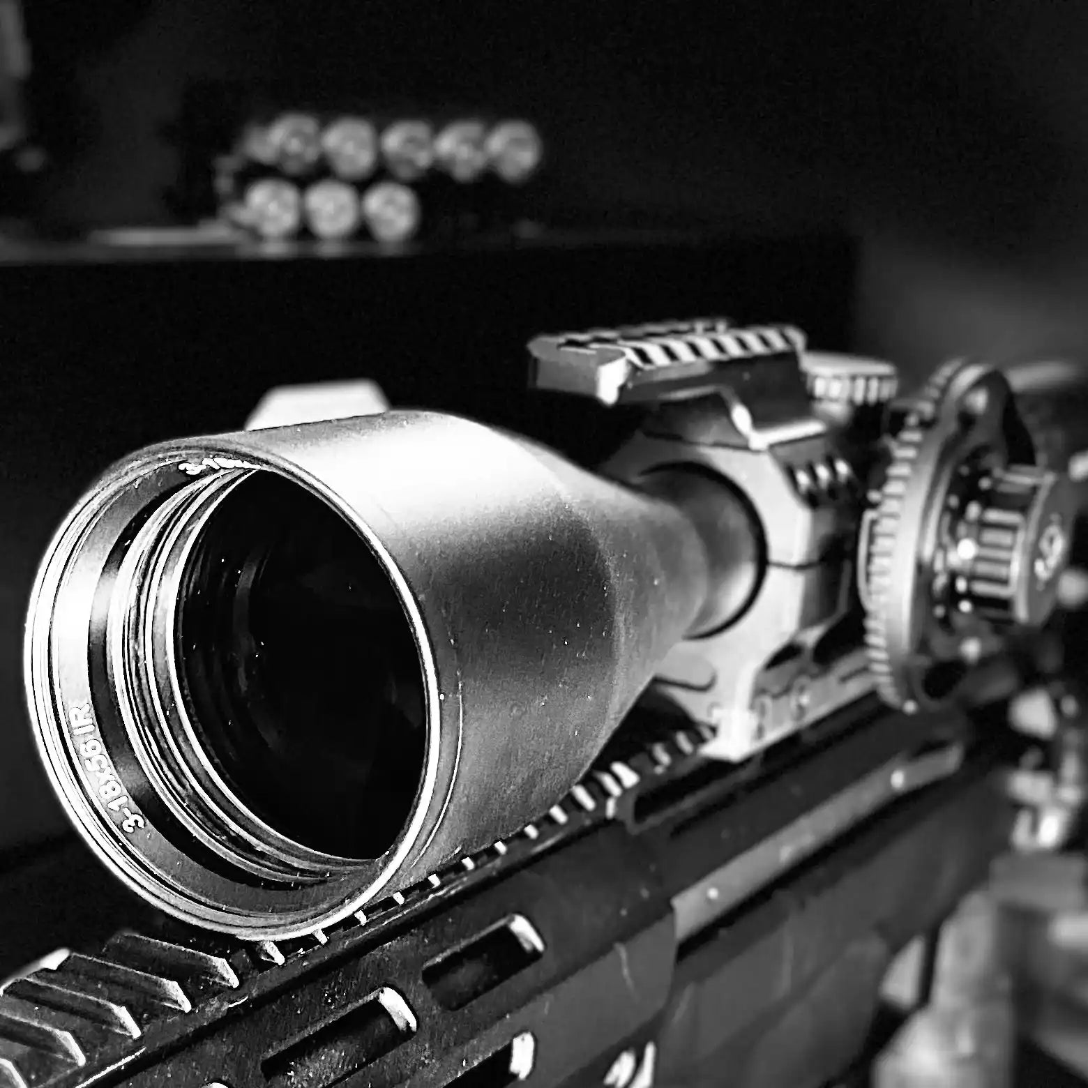 Close-up of SNIPA POLAR X tactical rifle scope with wide-angle 30mm tube and mount, black. TUTT