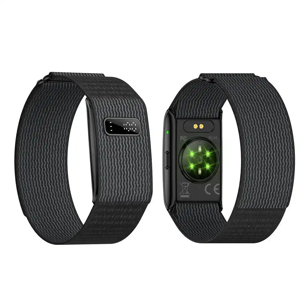 Black silicone smart bracelet with heart rate sensor, blood oxygen and pressure monitor, shown from front and back. TUTT