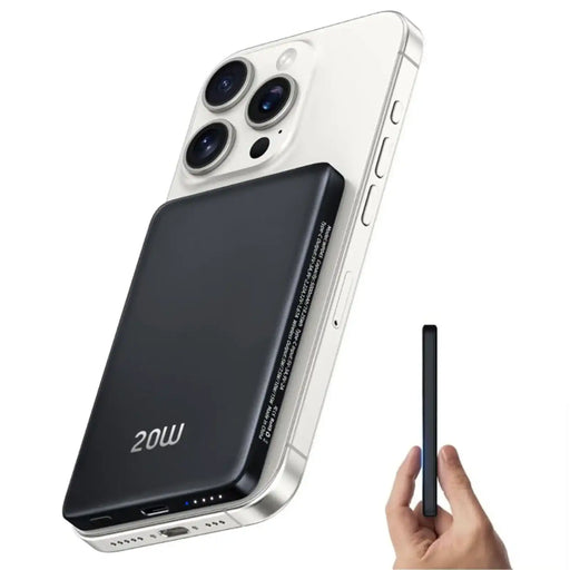 Black 20W slim portable power bank attached to back of white smartphone with triple cameras, held by hand TUTT