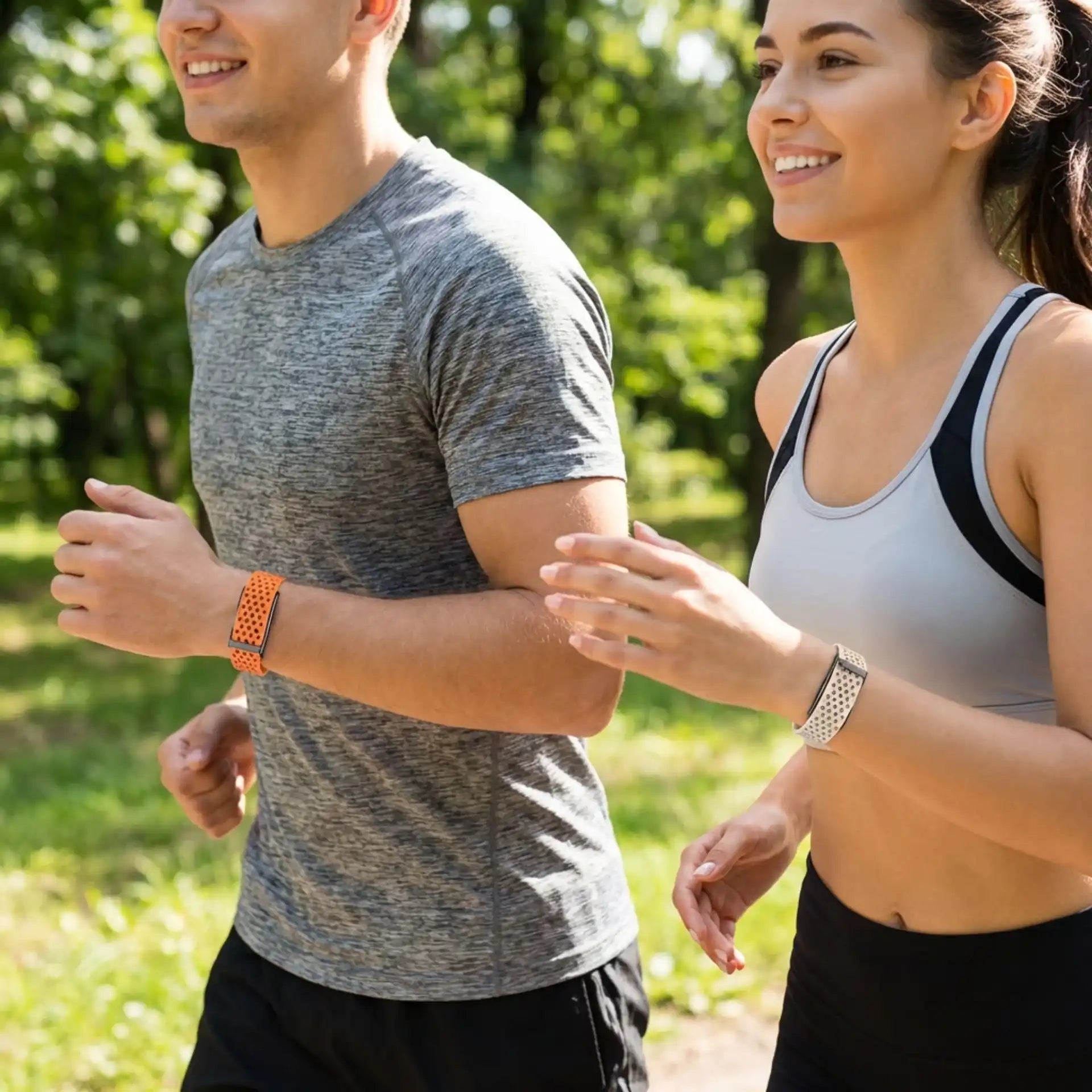 Man and woman jogging outdoors wearing smart fitness bracelets, running in activewear, TUTT
