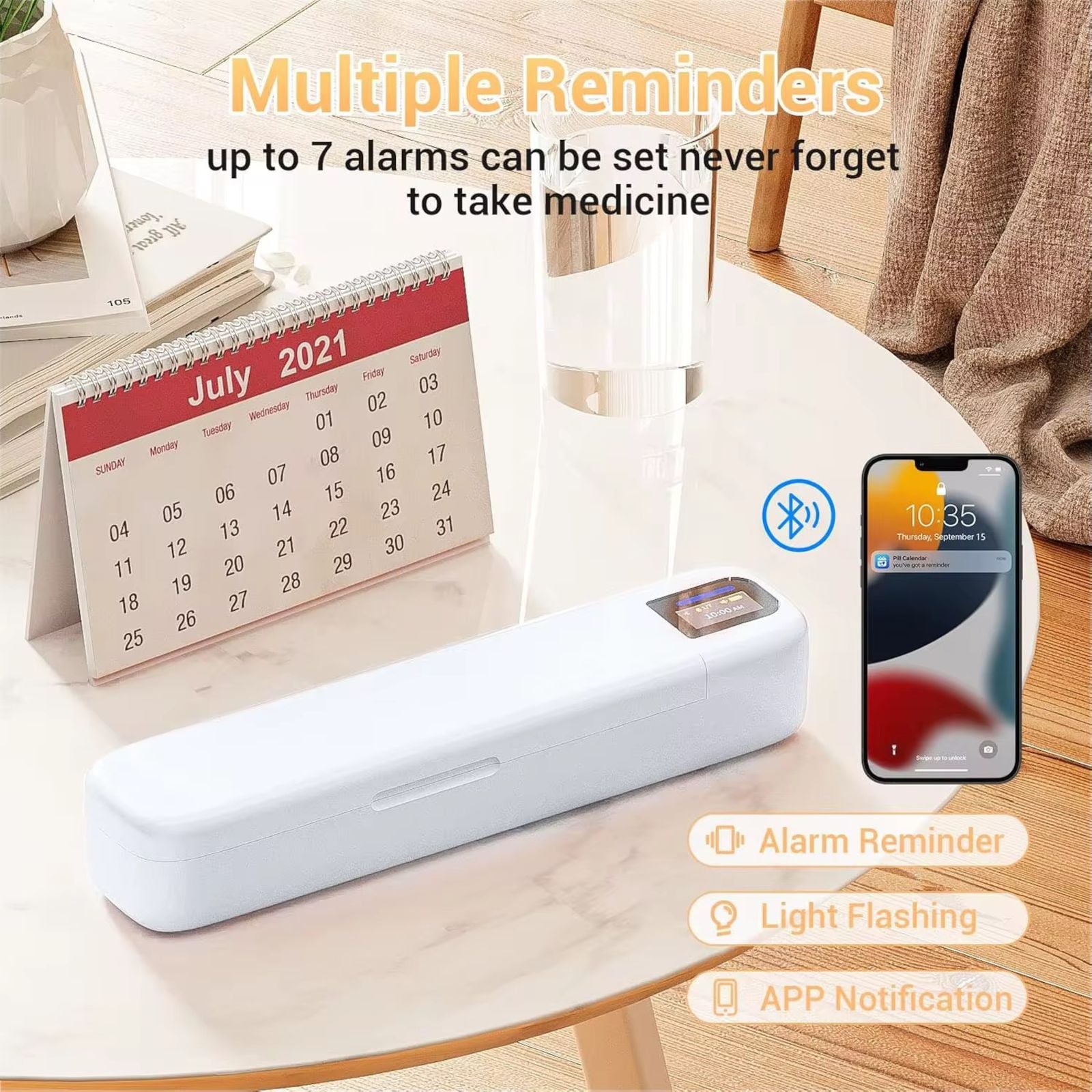 White smart pill organizer on table with digital clock, calendar, water glass, and smartphone showing medicine reminders TUTT