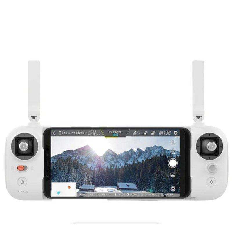 FIMI drone remote controller with smartphone display showing snowy mountain landscape, GPS, 4K camera controls. TUTT