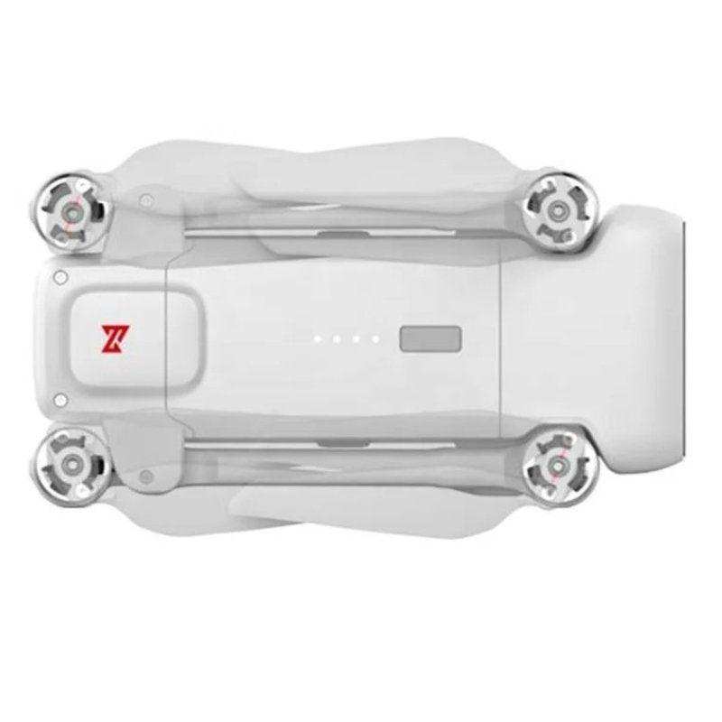 Folded FIMI X8SE 2022 V2 4K drone, white body, top view, compact quadcopter design TUTT
