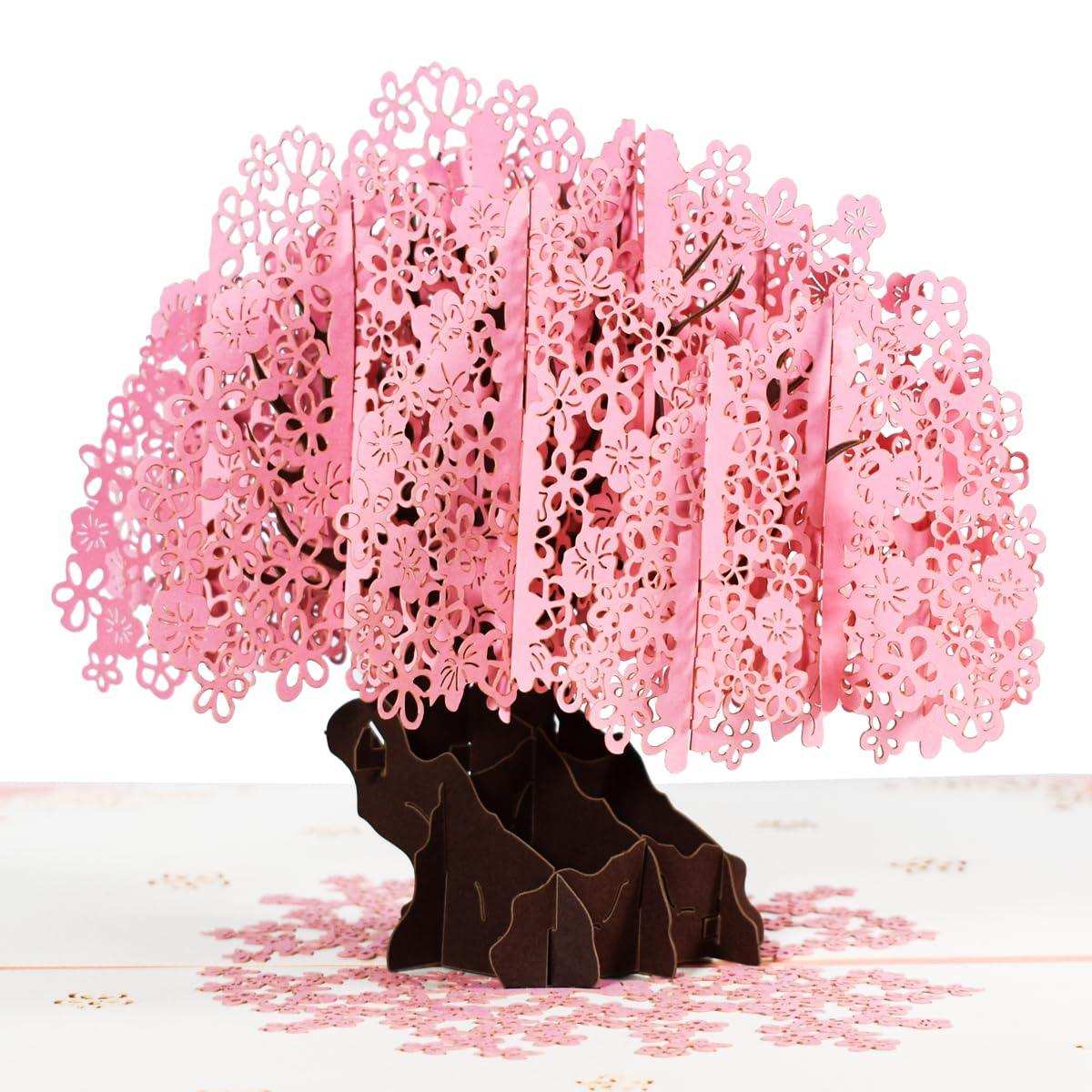 Pop-up greeting card with pink cherry blossom tree, intricate laser-cut flowers, and brown trunk TUTT