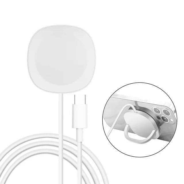 White magnetic wireless charging pad with USB-C cable, shown attached to a smartphone. TUTT