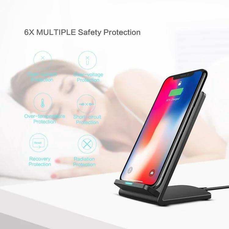 Wireless foldable charger stand charging a smartphone on a nightstand, safety protection icons, TUTT
