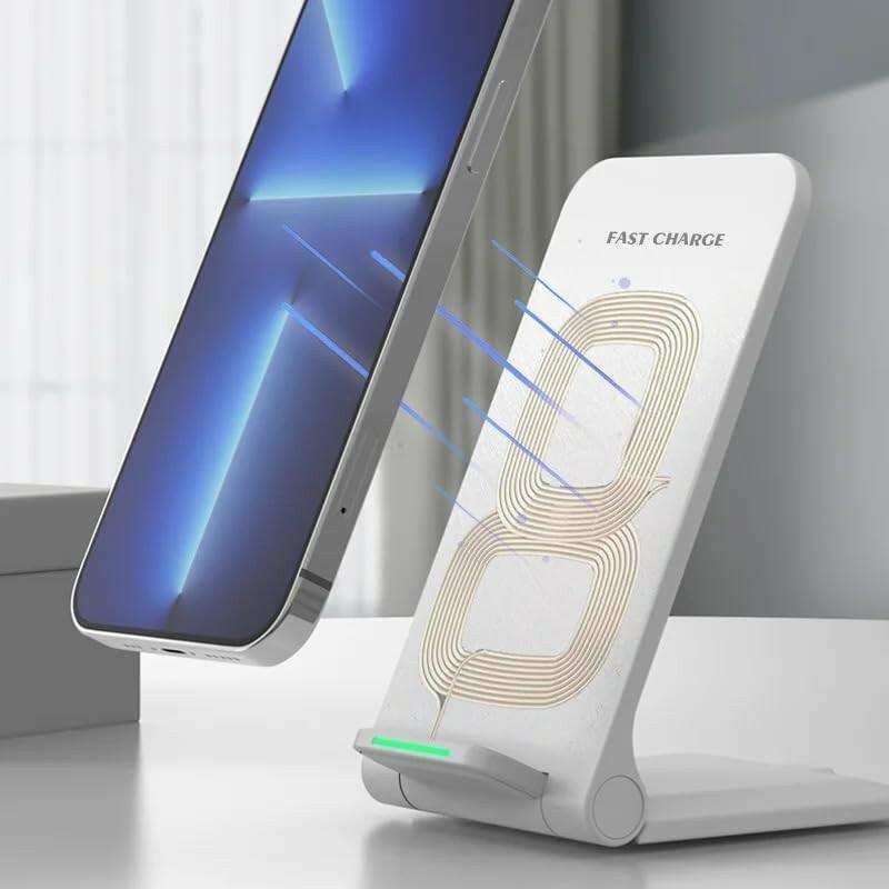White foldable wireless charger stand with phone, fast charge text visible, on desk, TUTT