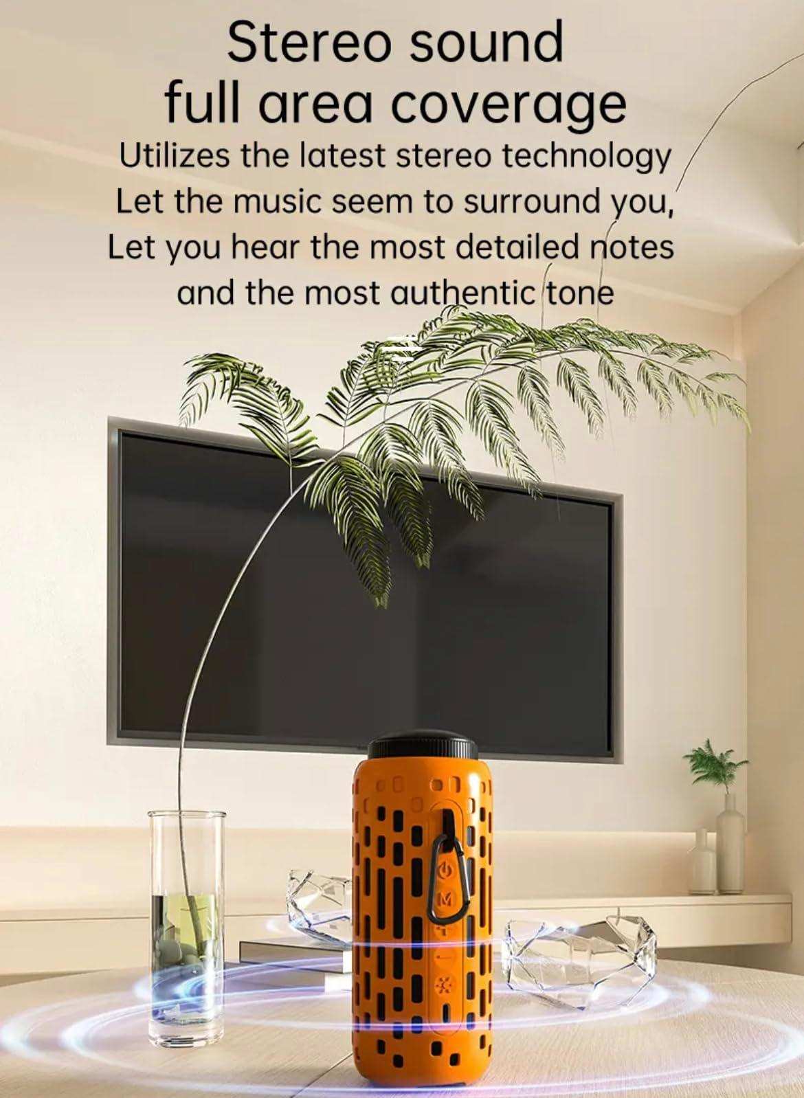 Orange waterproof mini speaker with hook on table, modern interior background, stereo sound effect, TUTT