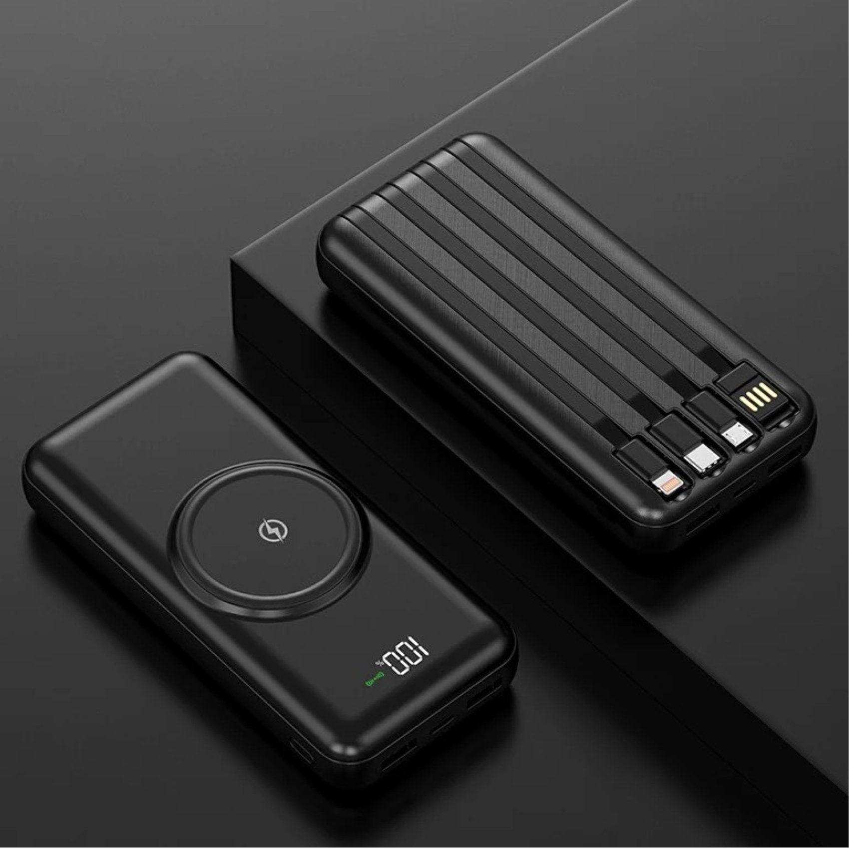 Black 30000mAh wireless portable charger with built-in cables, LED display, and USB outputs on a black surface. TUTT