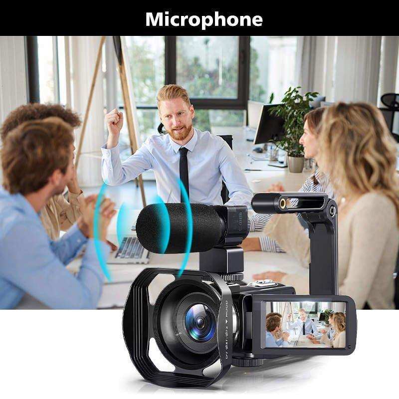 Digital camcorder with external microphone and flip screen recording office meeting, TUTT