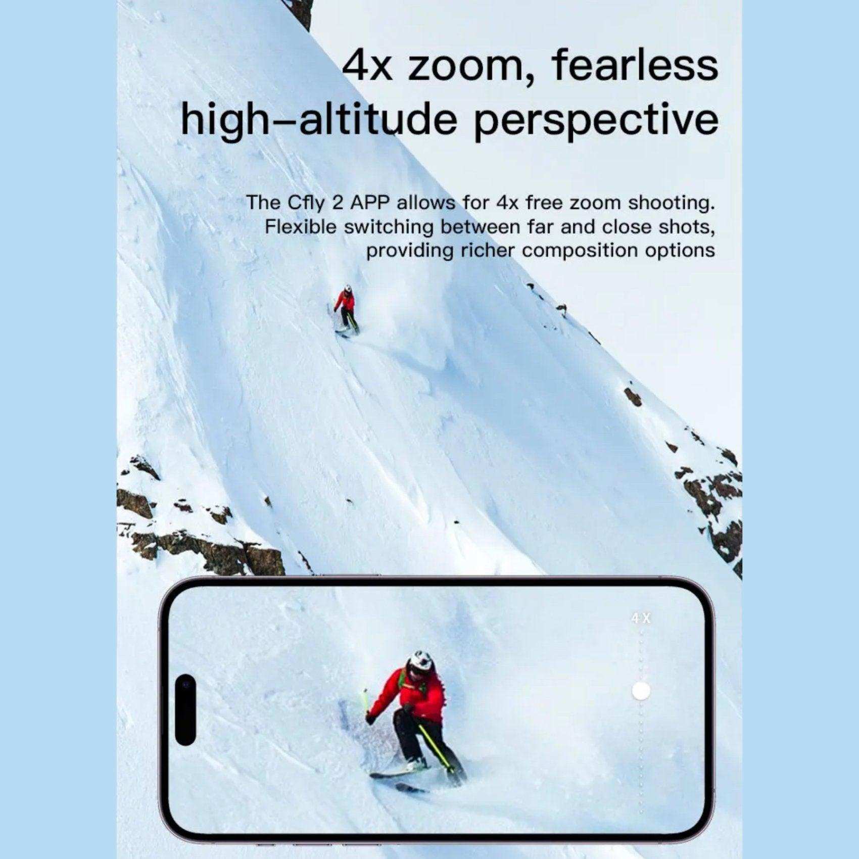 Skier in red jacket on snowy mountain slope, shown with 4x zoom drone camera on smartphone screen TUTT