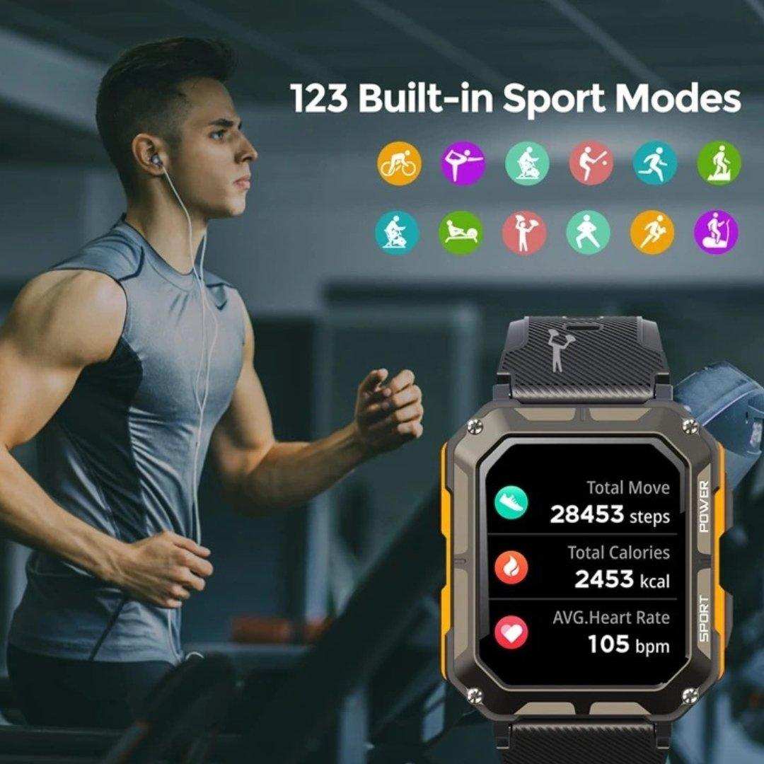 Man running indoors wearing earphones, with rugged military smartwatch displaying fitness stats and sport mode icons, 123 built-in sport modes. TUTT