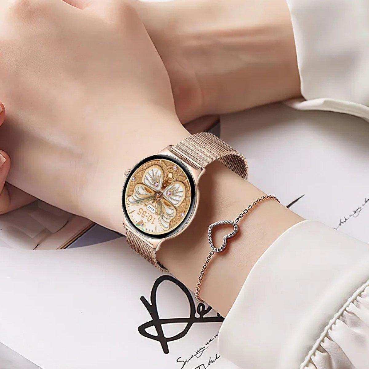 Elegant gold ultra-thin smart watch with butterfly display on a woman's wrist, TUTT