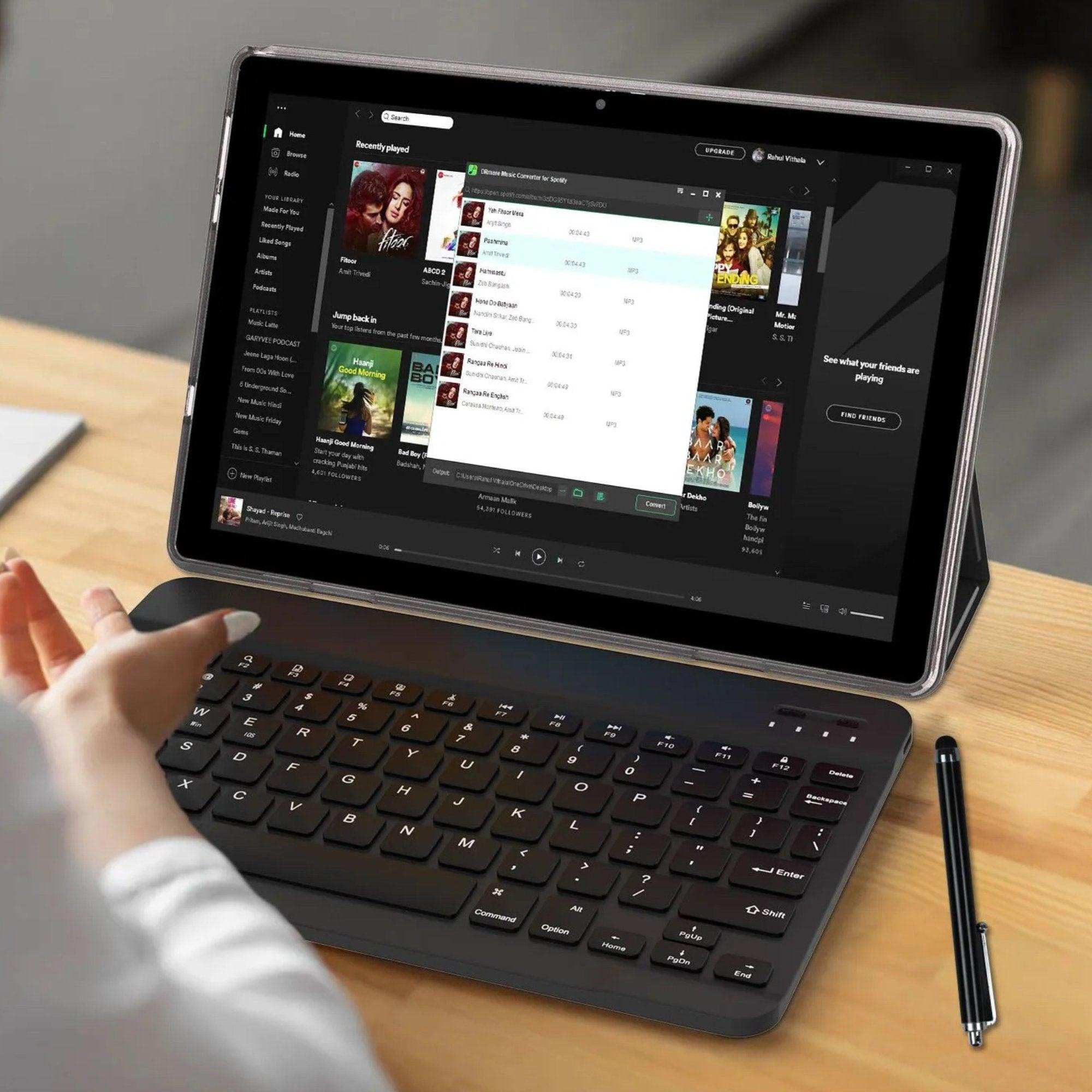 10.1 inch Android tablet with keyboard, stylus, and streaming music app on screen, TUTT