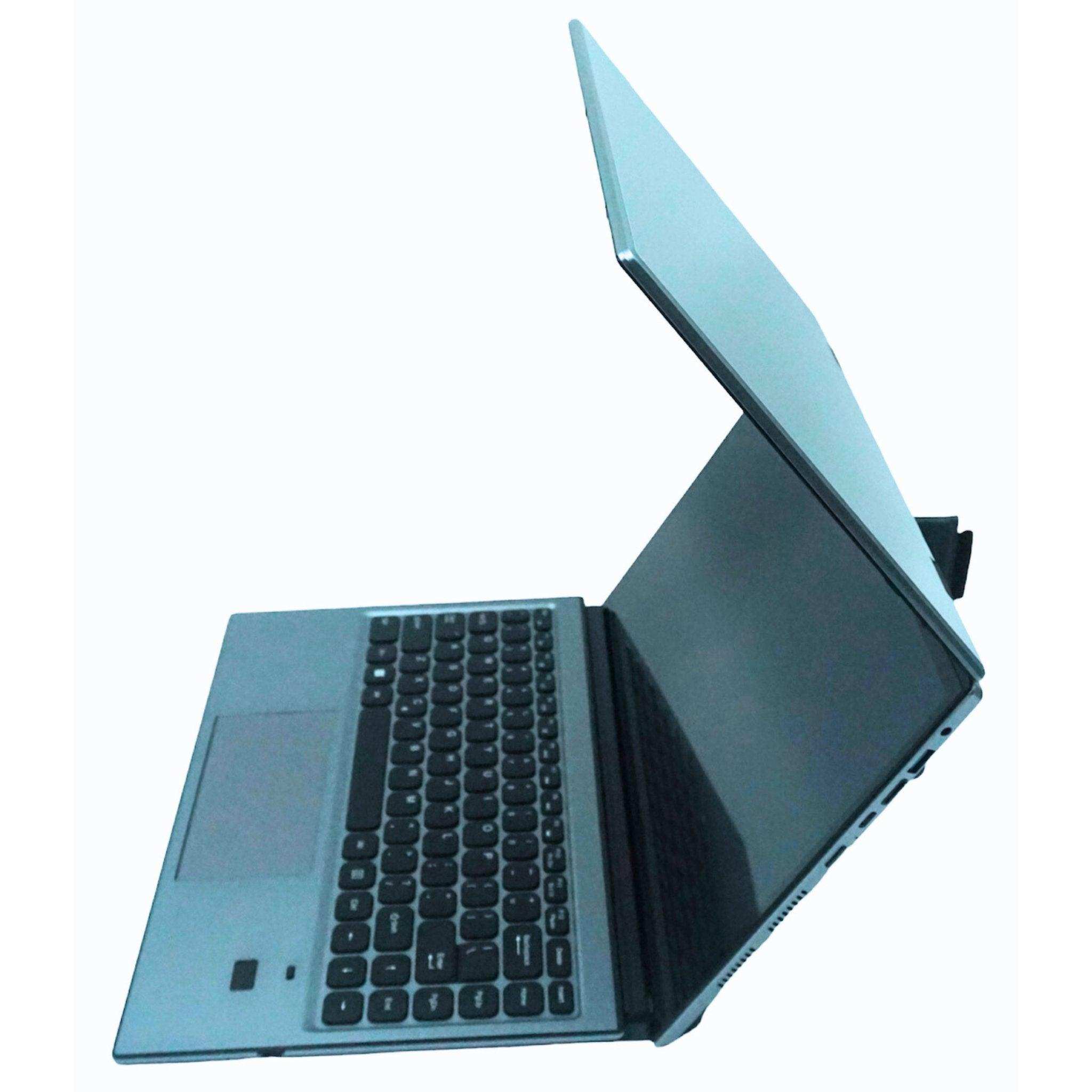 Gray 2-in-1 laptop with open dual touch screen, keyboard, and stand, side view TUTT