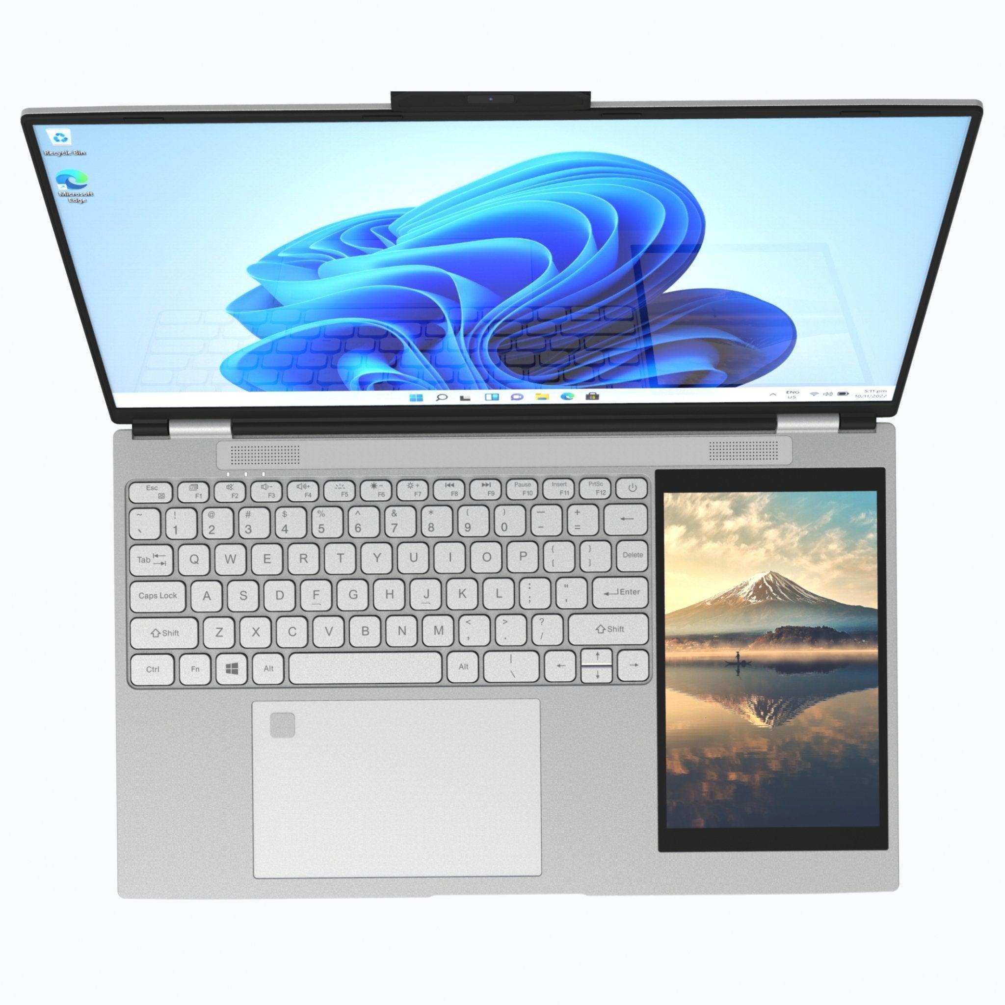 Silver dual-screen laptop with mini touchscreen, backlit keyboard, and Windows 11 open. TUTT