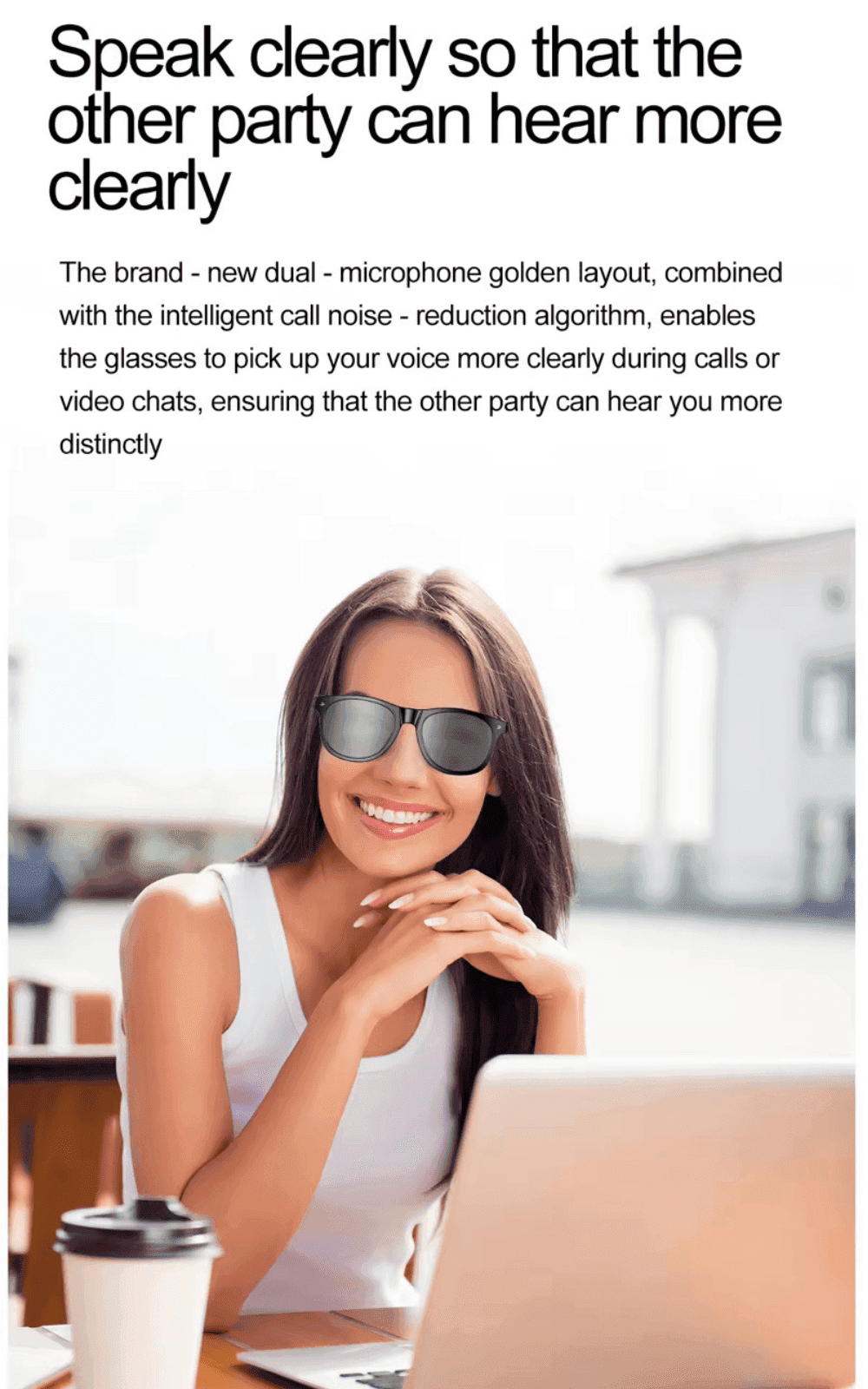 Smiling woman wearing smart Bluetooth sunglasses at outdoor table with coffee and laptop, TUTT