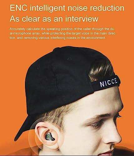 Young man wearing black cap and zinc alloy wireless gaming earbuds with mic, orange background, TUTT
