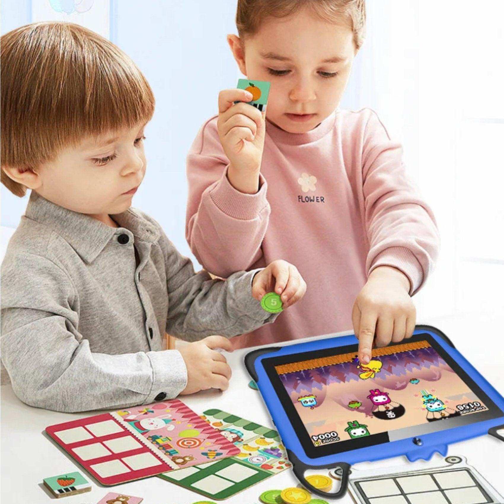 Two children play and learn with a blue-rugged kids educational tablet and game tokens, TUTT