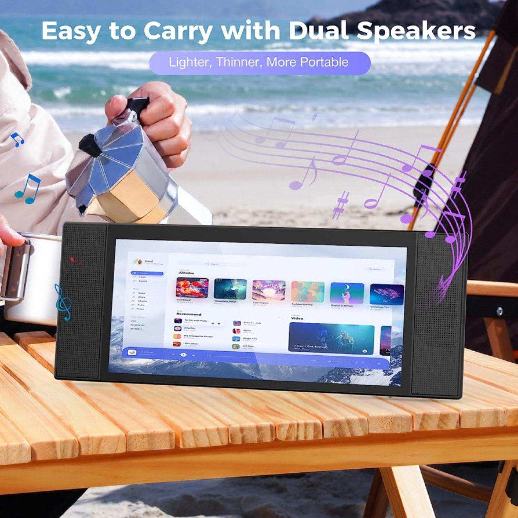Portable laptop and cellphone monitor extender with dual speakers on a wooden table at the beach, TUTT