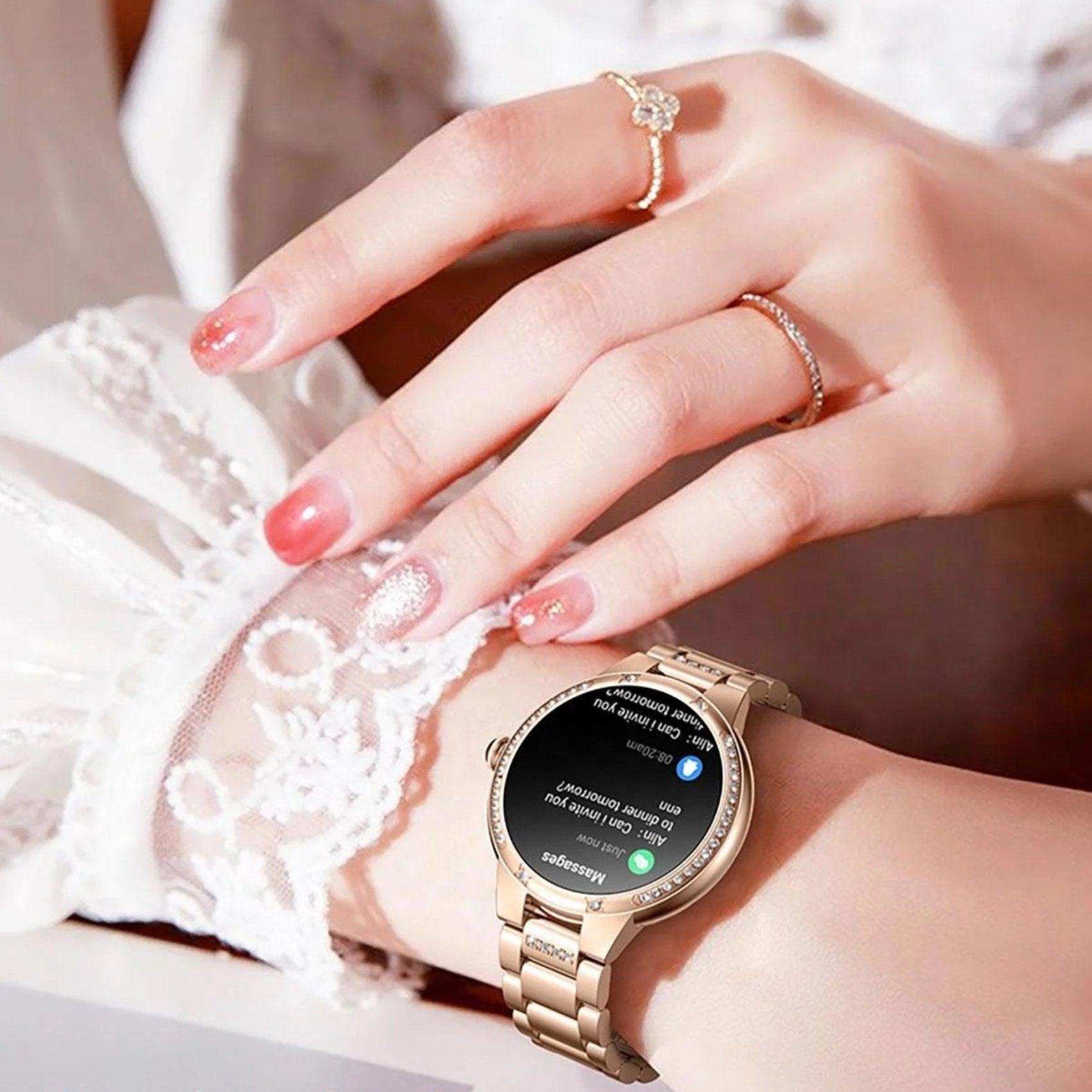 Gold ladies AMOLED smart watch with message display on wrist, lace sleeve, and rings, TUTT