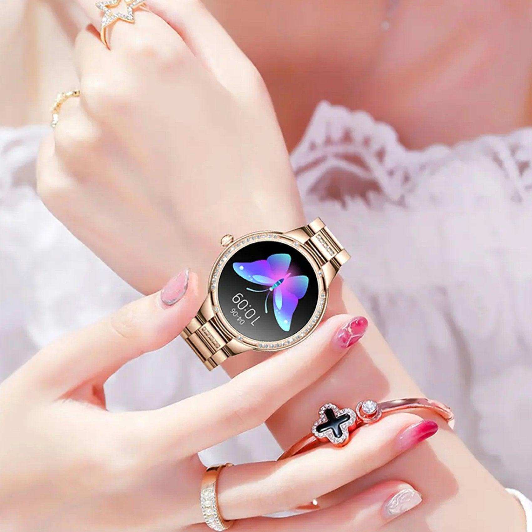 Rose gold ladies AMOLED smart watch with butterfly display on woman's wrist, stylish jewelry, TUTT