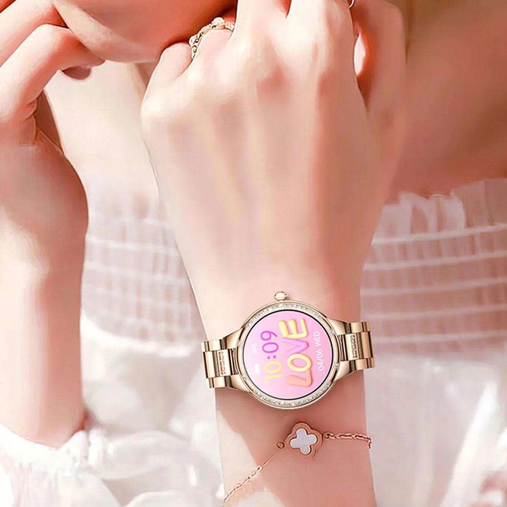 Gold classic ladies AMOLED screen smart watch with 'LOVE' display on woman's wrist, TUTT