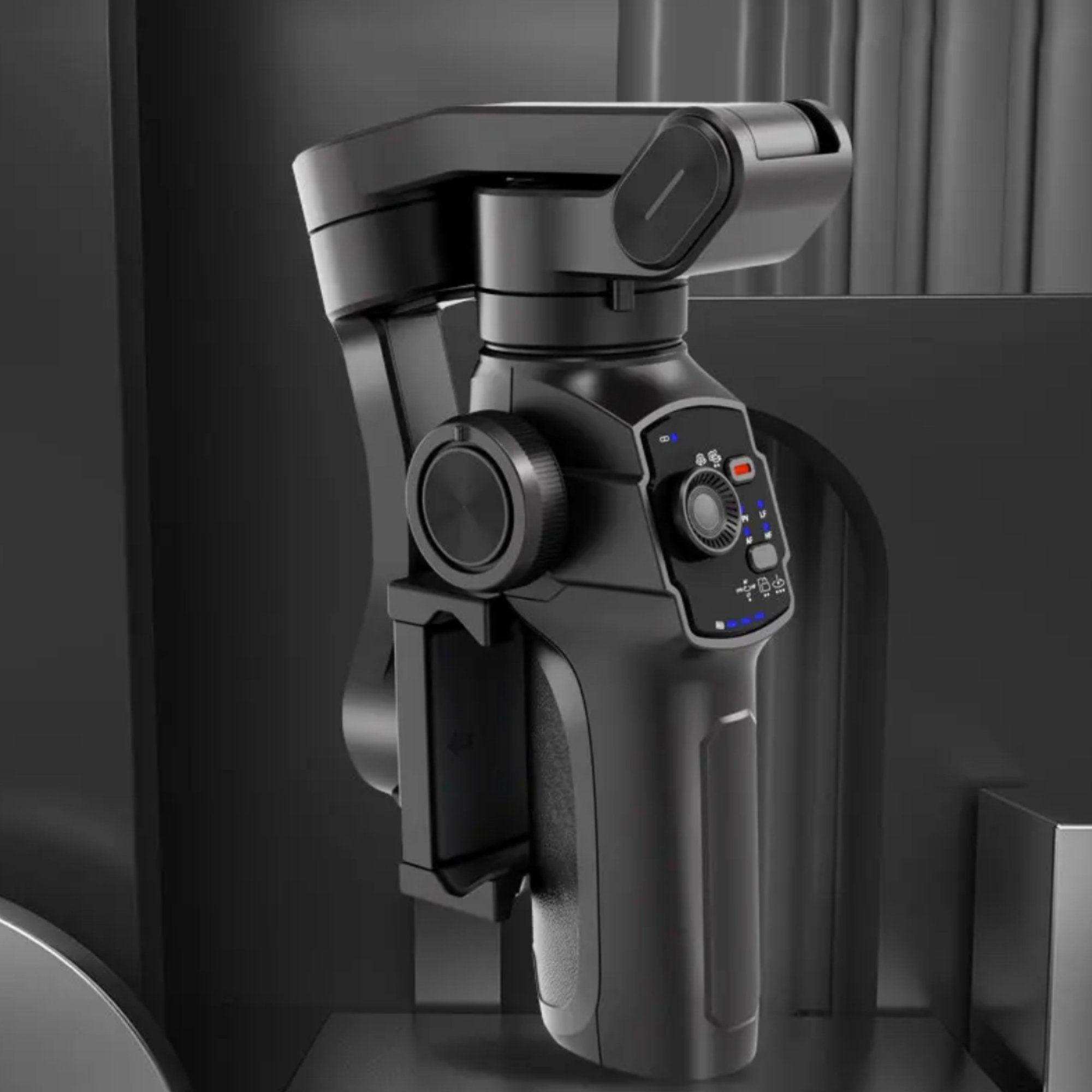 Black 3-axis smartphone gimbal stabilizer with control panel on display stand, TUTT