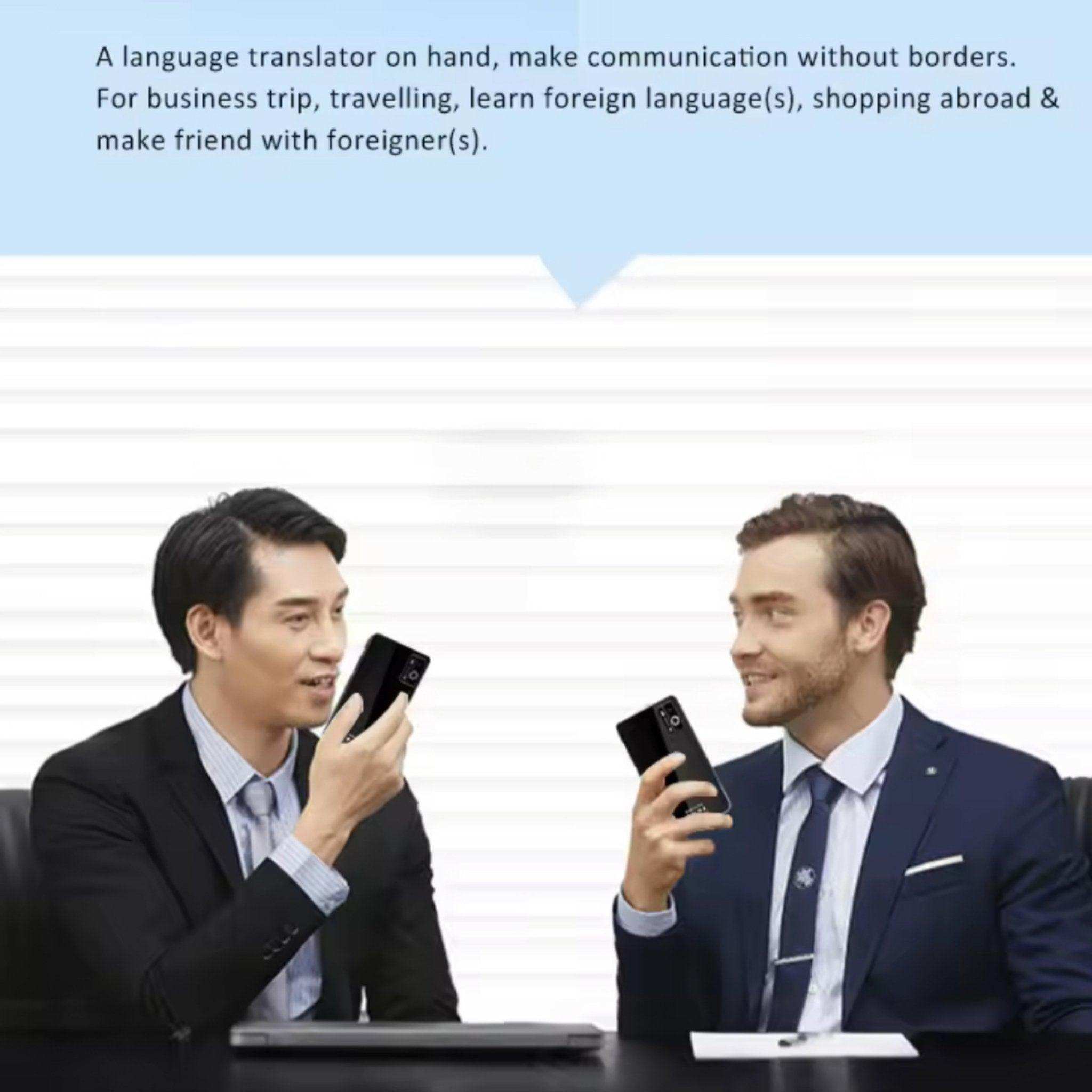 Two businessmen use TUTT AI voice language translator devices at a desk in an office setting. TUTT