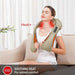 Woman using shiatsu neck and shoulder massager with heat on a couch, relaxing comfort TUTT