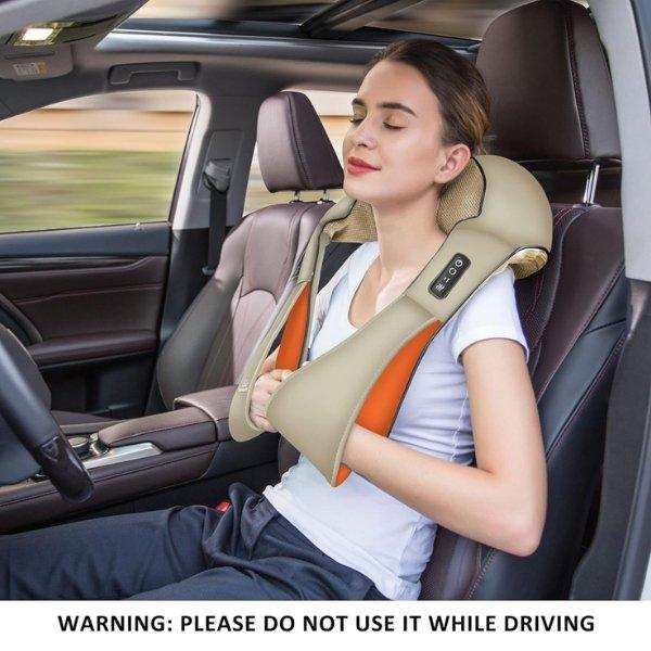 Woman using shiatsu neck and shoulder massager in a car, relaxing with eyes closed, TUTT