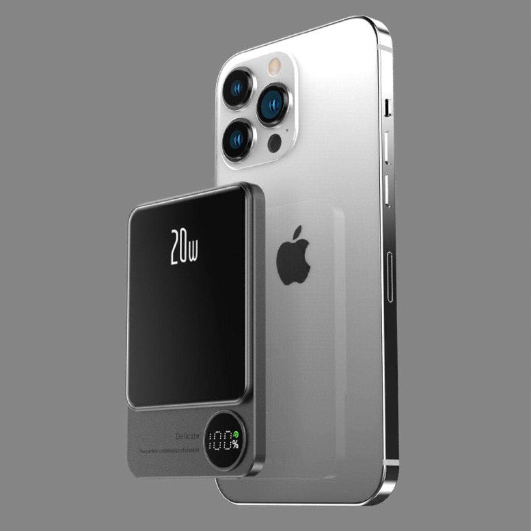 All-metal MagSafe wireless power bank with LED display attached to silver iPhone. TUTT