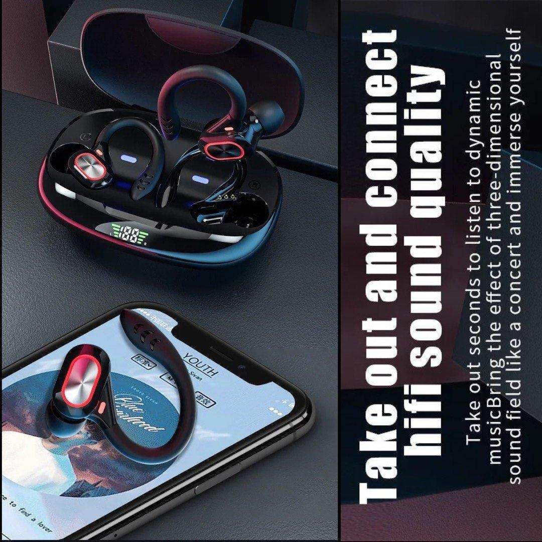 Black wireless Bluetooth earbuds with ear hooks, charging case with LED display, and smartphone on dark surface. TUTT
