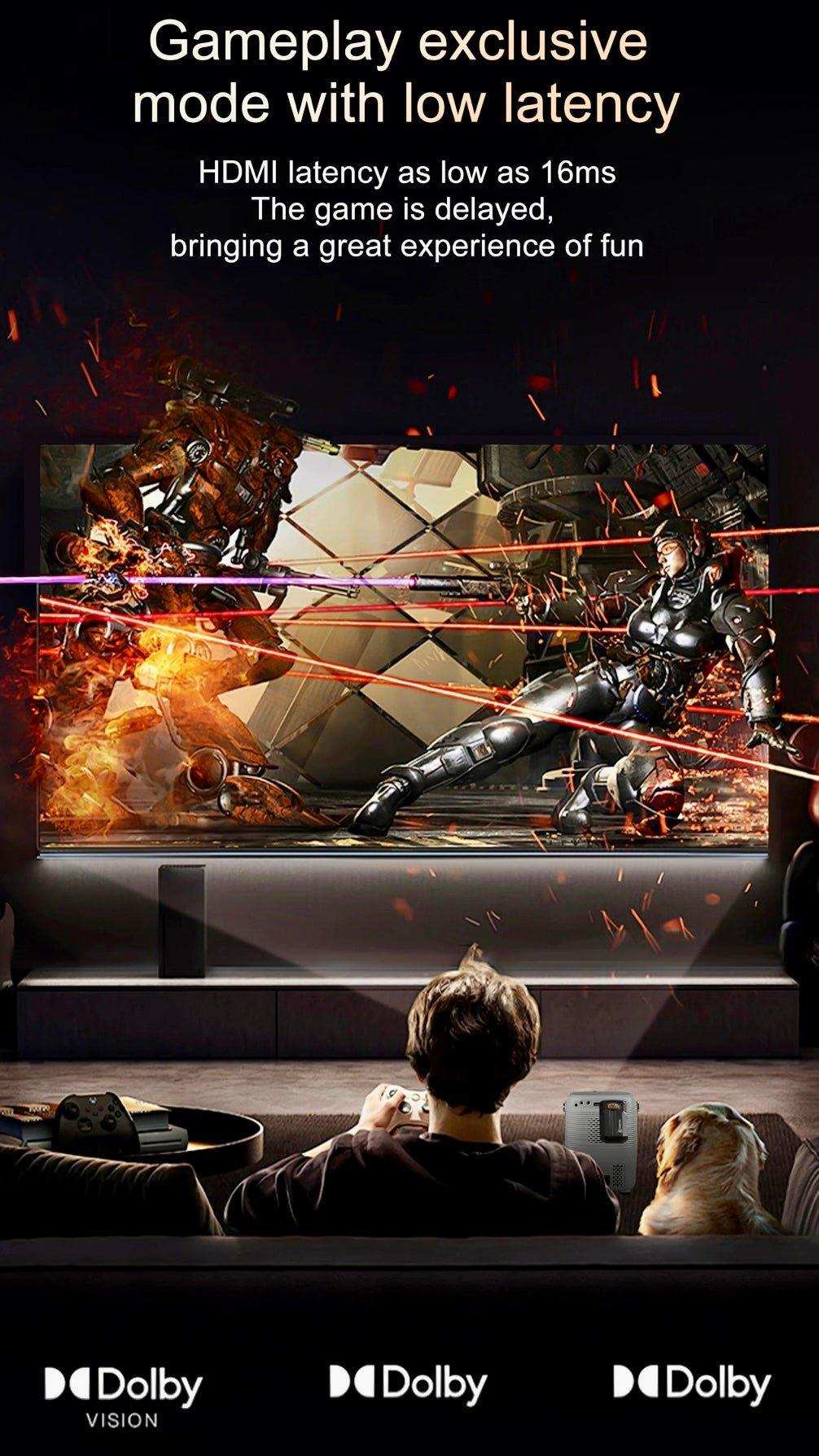 Man gaming with controller on sofa, 4K projector displays action scene, Dolby Vision icons visible. TUTT