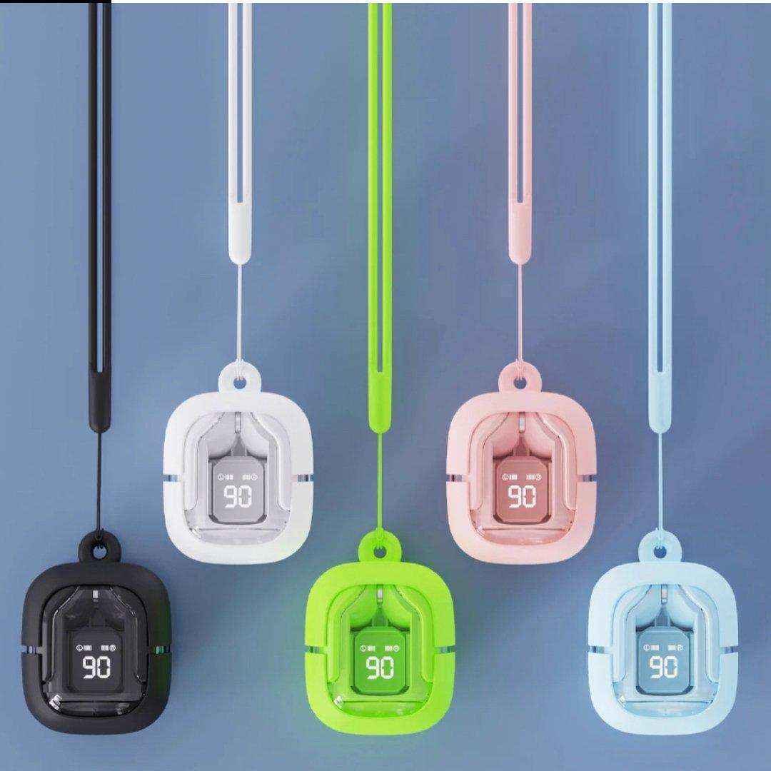 Five colorful TUTT T6 BT-53 wireless earbuds with digital display in transparent cases, hanging. TUTT