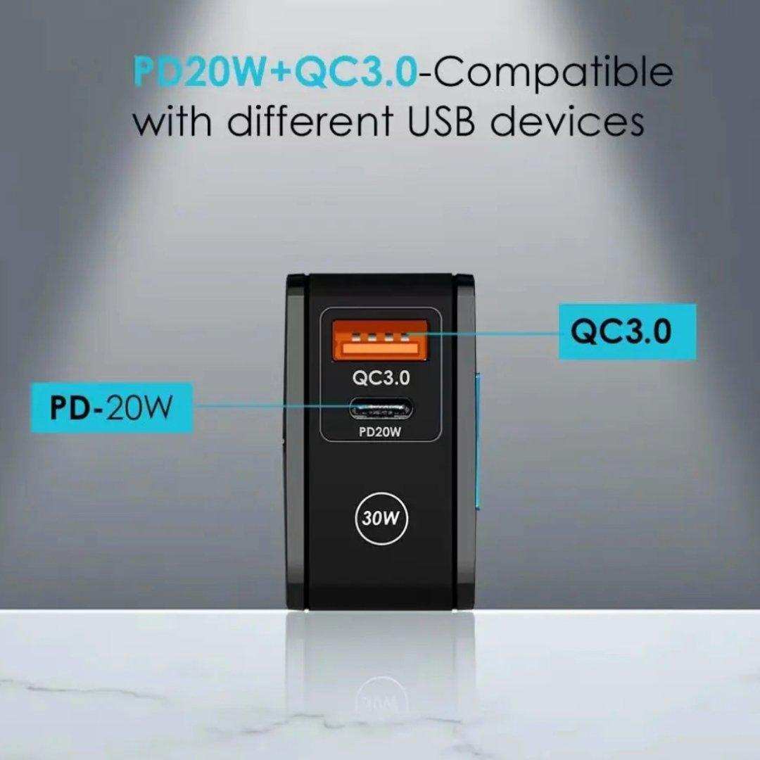 PD20W and QC3.0 30W USB charger with orange and black ports, compatible with USB devices, on a white surface. TUTT