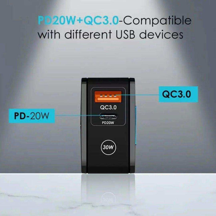 PD20W and QC3.0 30W USB charger with orange and black ports, compatible with USB devices, on a white surface. TUTT