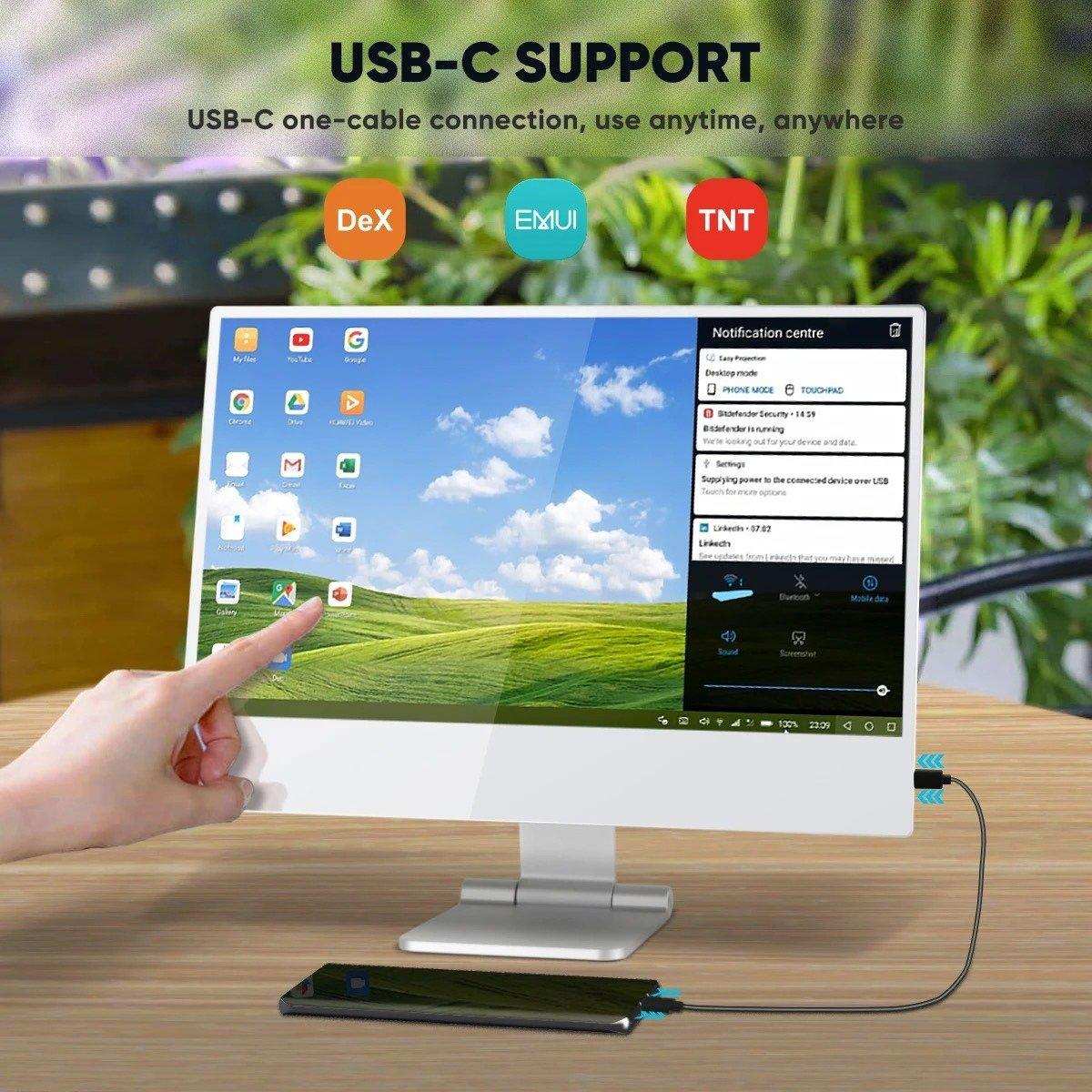 Hand touches 16-inch portable touchscreen monitor with USB-C support on wooden desk, TUTT