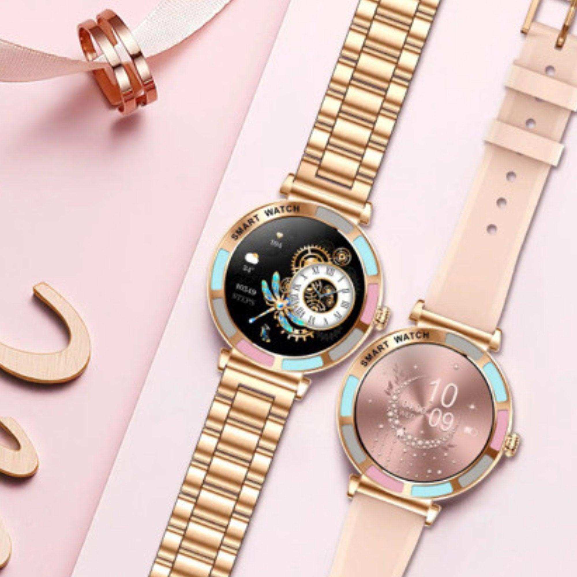 Two women's smart watches with gold and pink accents on a pink background, TUTT